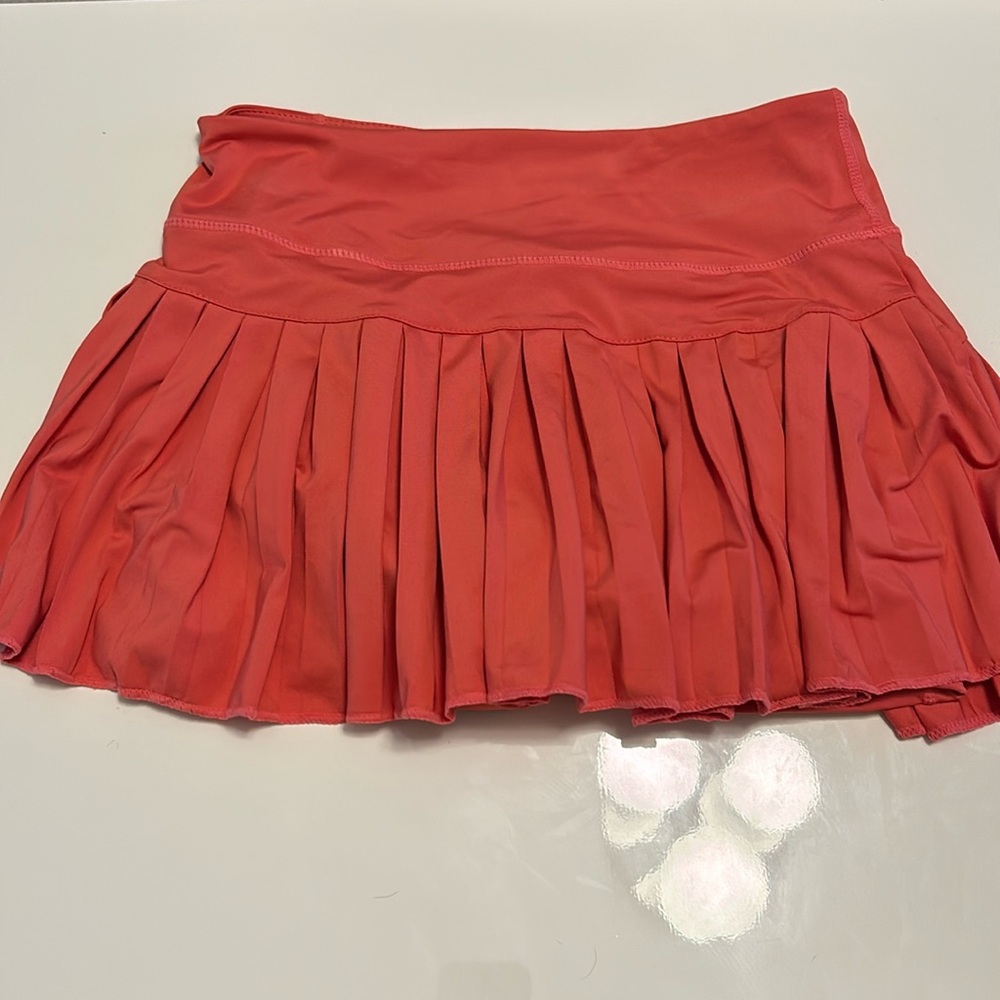 Brand new, without tags, GOLD HINGE skirt